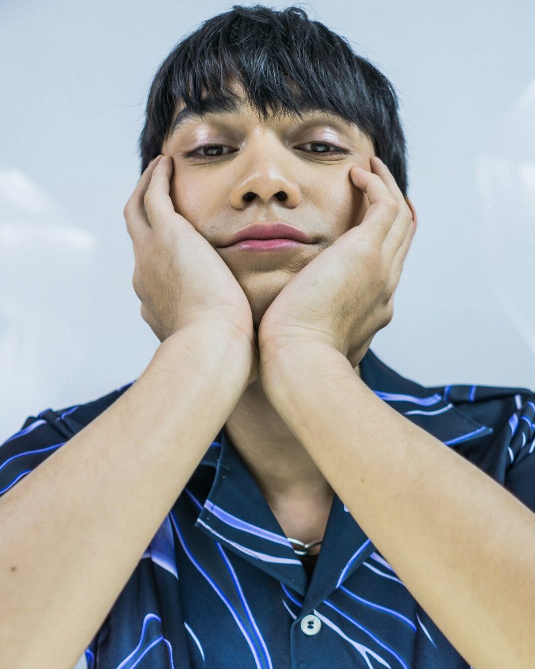 Portrait of a young man with a calm expression